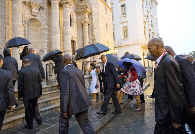 President Barack Obama, center, and first lady Michelle Obama, visit la Catedral de La Habana in Havana, Cuba, Sunday, March 20, 2016. Obama's trip is a crowning moment in his and Cuban President Raul Castro's ambitious effort to restore normal relations between their countries. (AP Photo/Pablo Martinez Monsivais)