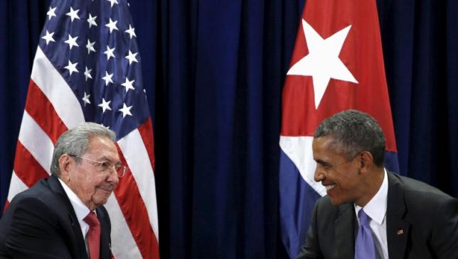 U.S. President Barack Obama and Cuban President Raul Castro meet at the United Nations General Assembly in New York September 29, 2015. REUTERS/Kevin Lamarque