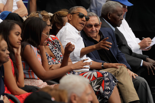 HAVANA, CUBA - MARCH 22:  U.S. President Barack Obama and Cuban President Raul Castro visit during an exhibition game between the Cuban national team and the Major League Baseball team Tampa Bay Devil Rays at the Estado Latinoamericano March 22, 2016 in Havana, Cuba. This is the first time a sittng president has visited Cuba in 88 years.  (Photo by Chip Somodevilla/Getty Images)
