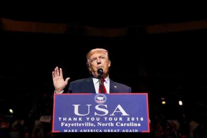 U.S. President-elect Donald Trump speaks at a USA Thank You Tour event at Crown Coliseum in Fayetteville, North Carolina, U.S., December 6, 2016. REUTERS/Shannon Stapleton