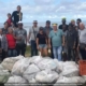Yorubas y ambientalistas limpian juntos playas de La Habana