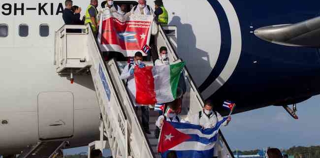 Hero's welcome as Cuban doctors return home after fighting Covid-19 in Italy