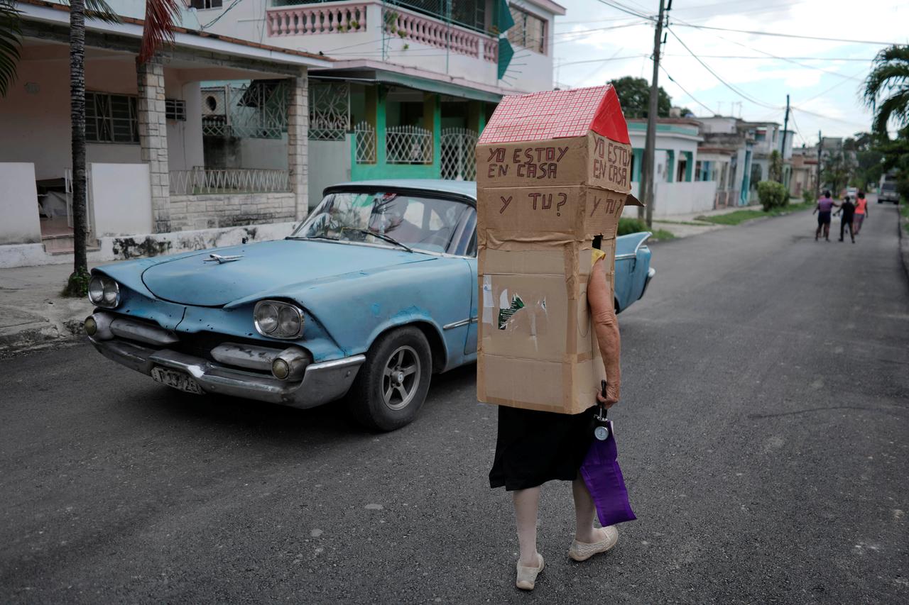 Cuban dons full-body cardboard shield against coronavirus