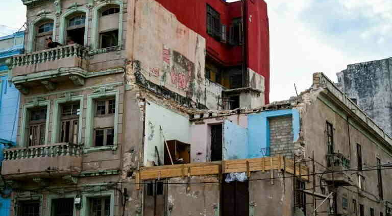 In Cuba Sleeping Fully Clothed In Case Of Building Collapse