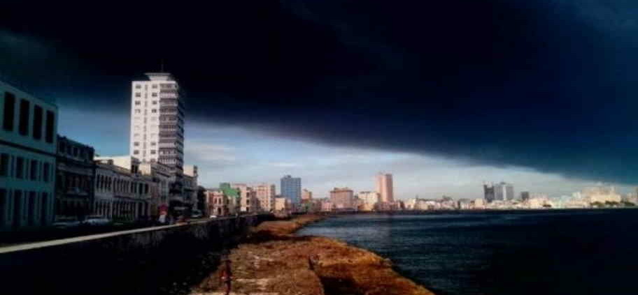 Dense smoke from a fire in Matanzas darkened Havana sky